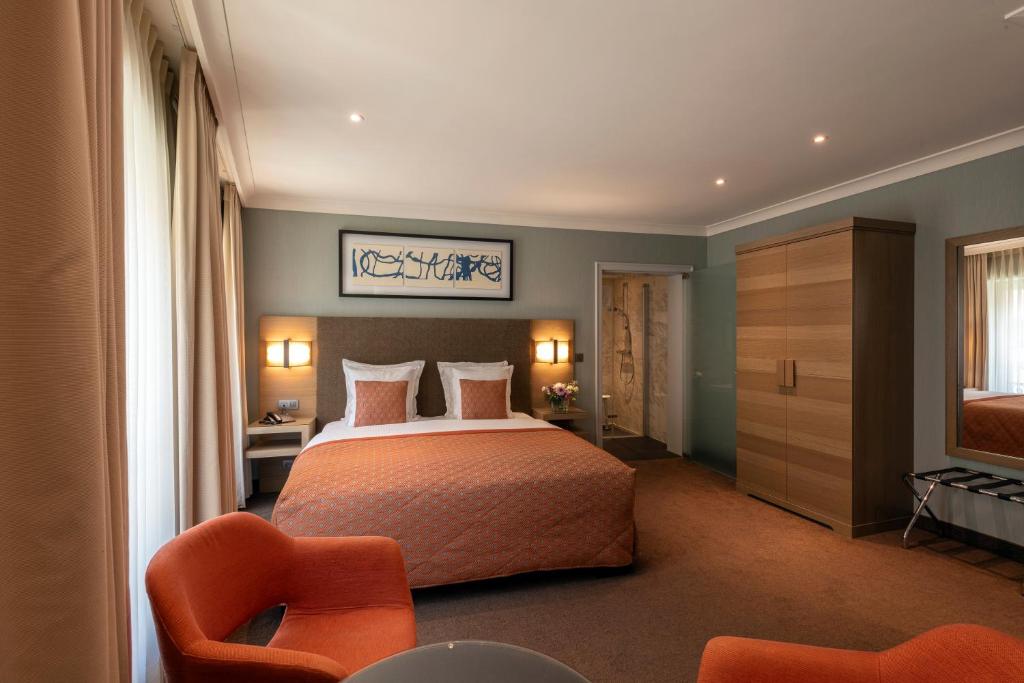 Una cama o camas en una habitación de Hotel Aragon