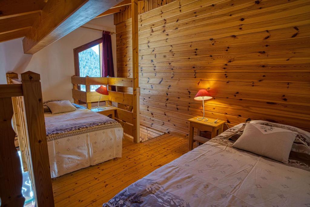 Postel nebo postele na pokoji v ubytování La Savoyarde