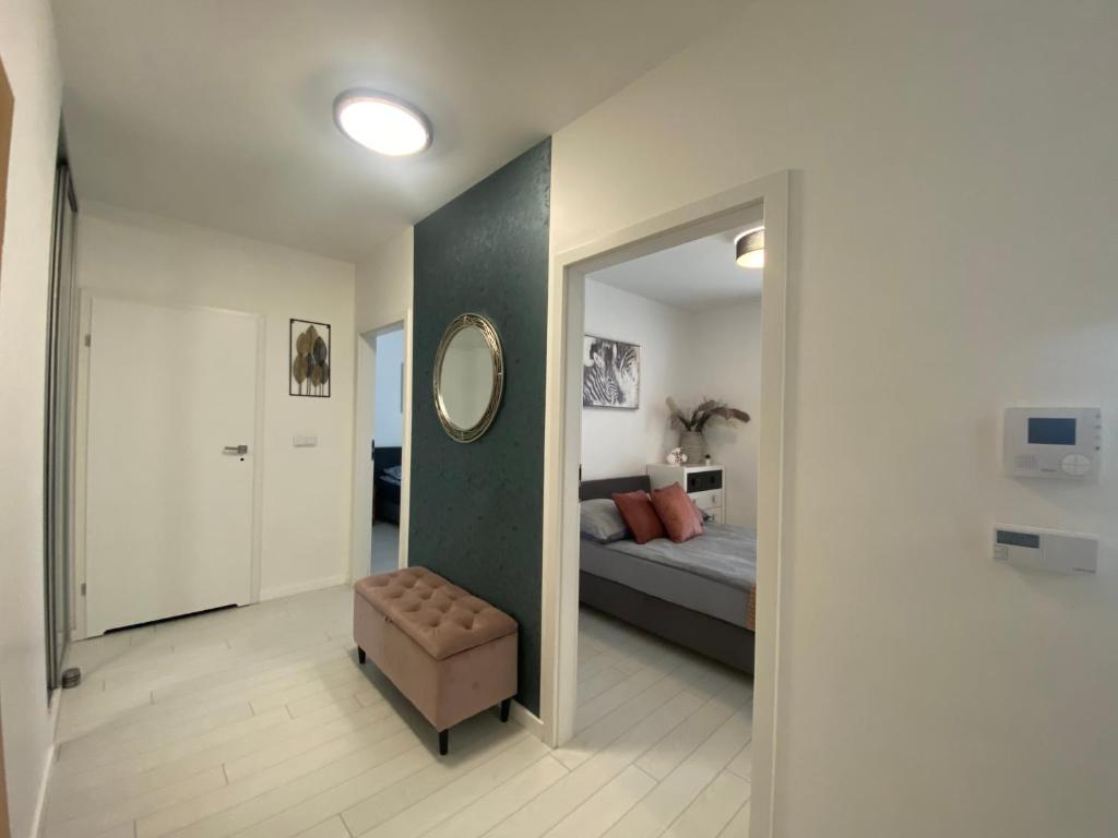 Posteľ alebo postele v izbe v ubytovaní Ann Apartament 16 piętro z widokiem na morze