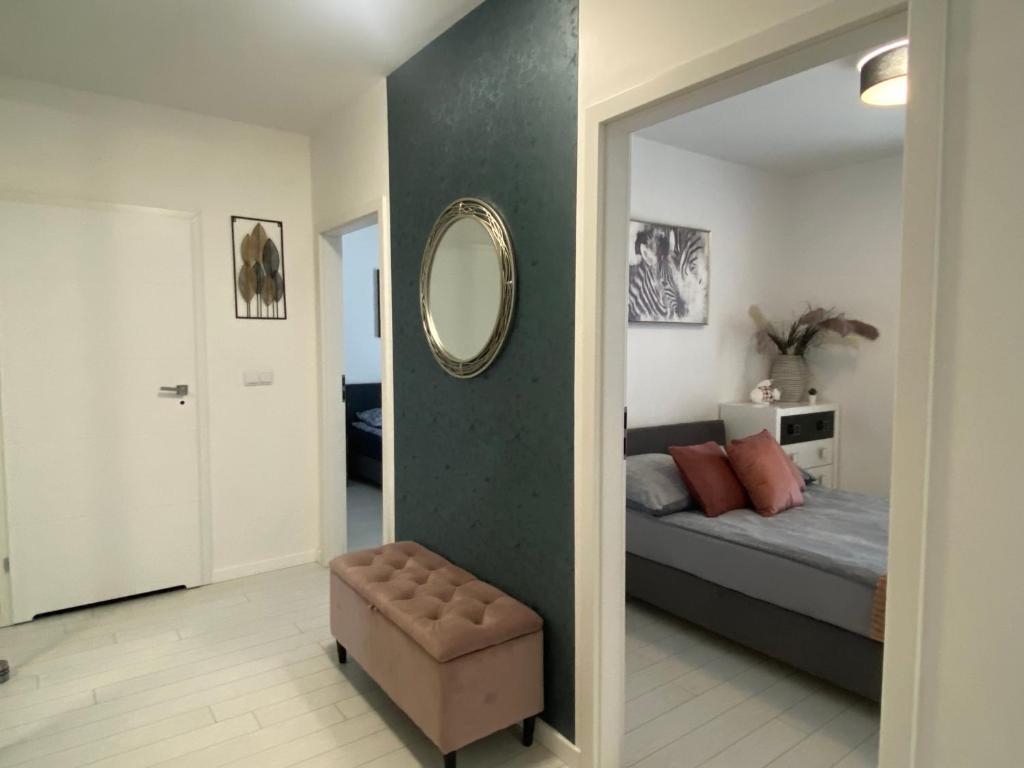 Posteľ alebo postele v izbe v ubytovaní Ann Apartament 16 piętro z widokiem na morze