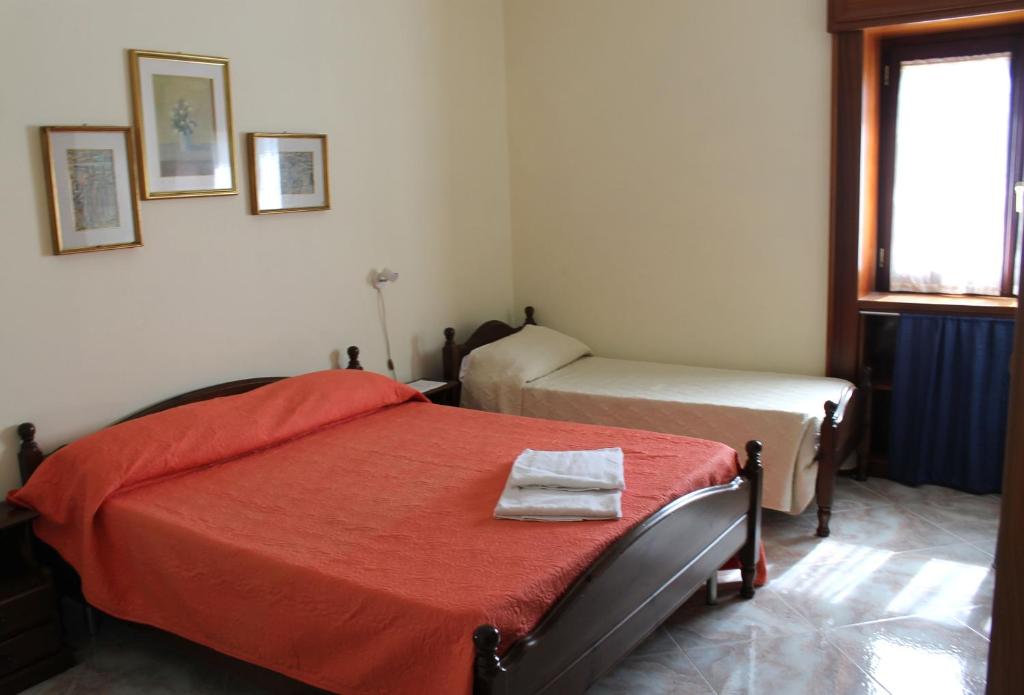 Posteľ alebo postele v izbe v ubytovaní Casa Annuccia