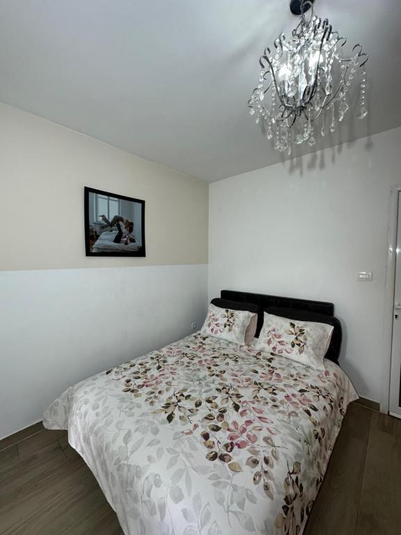 Postel nebo postele na pokoji v ubytování Apartmani Simona