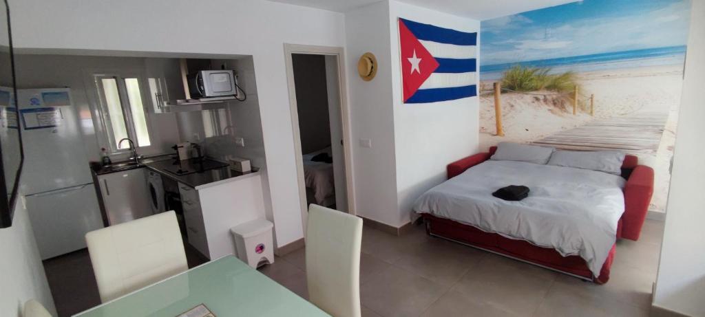 Postel nebo postele na pokoji v ubytování El Rinconcito Cubano en la playa