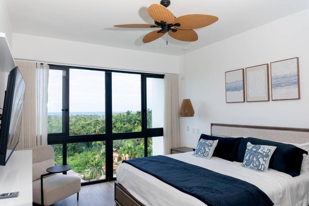 Ένα ή περισσότερα κρεβάτια σε δωμάτιο στο 2 BR Ocean view apt playa bonita