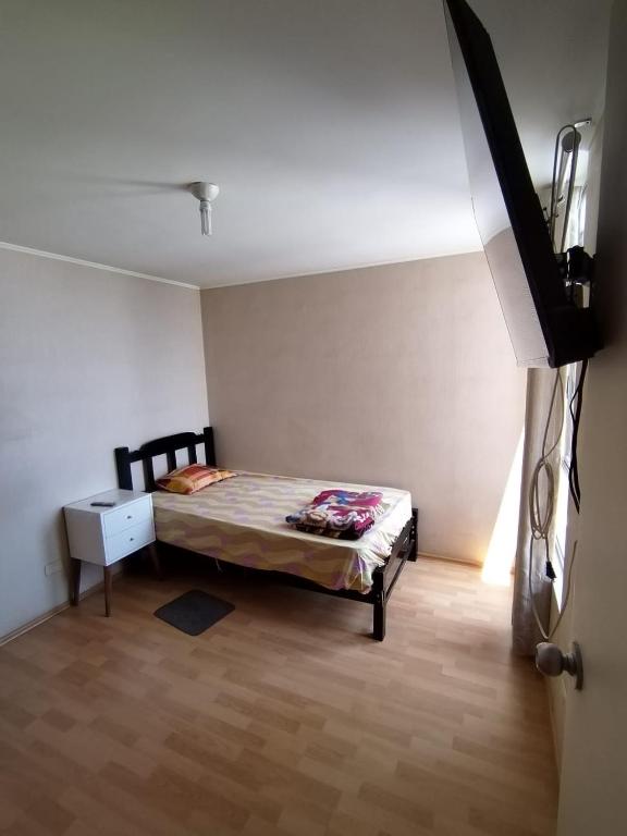 Ein Bett oder Betten in einem Zimmer der Unterkunft CONDOMINIO ALTO COLONIAL- TORRE ROBLE- DEPARTAMENTO 1104