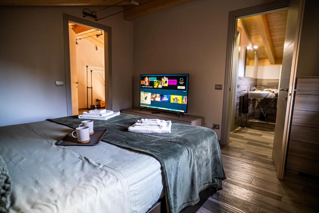 Postel nebo postele na pokoji v ubytování Monte Moro Gavi B&B