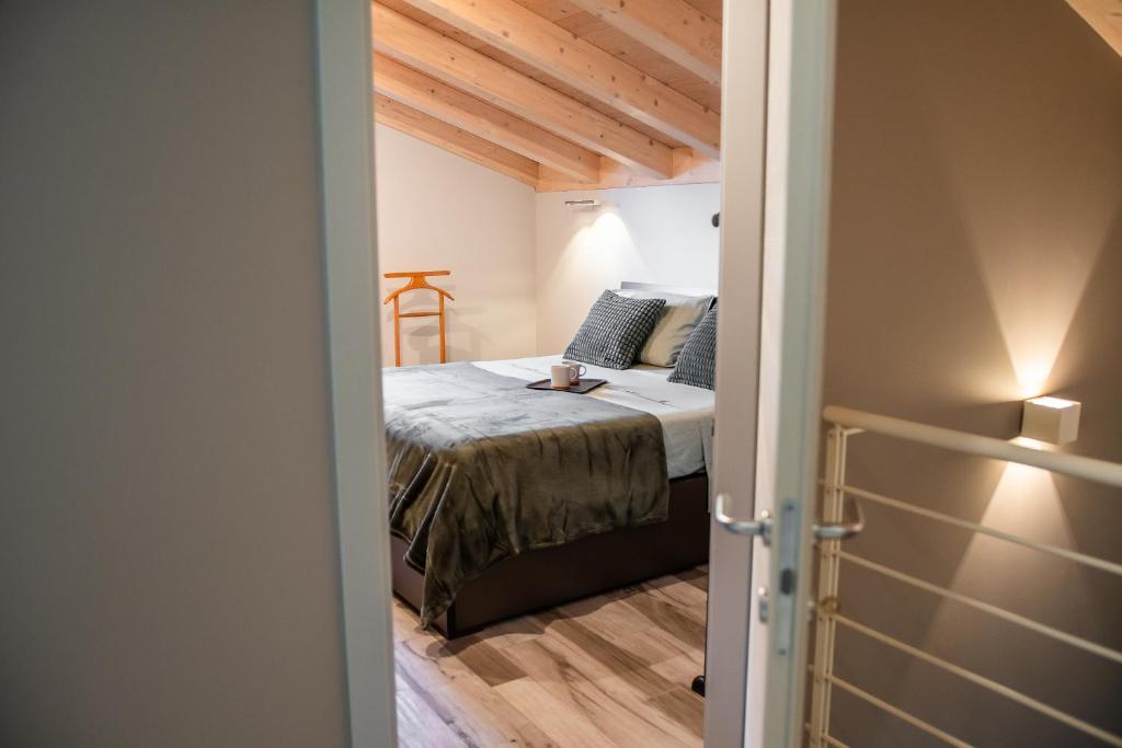 Postel nebo postele na pokoji v ubytování Monte Moro Gavi B&B