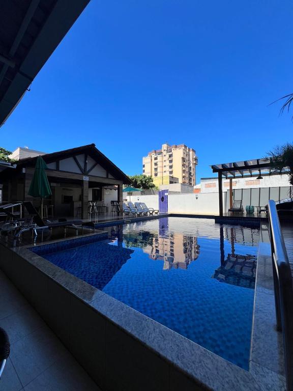 Bazén v ubytování Nayru Hotel nebo v jeho okolí