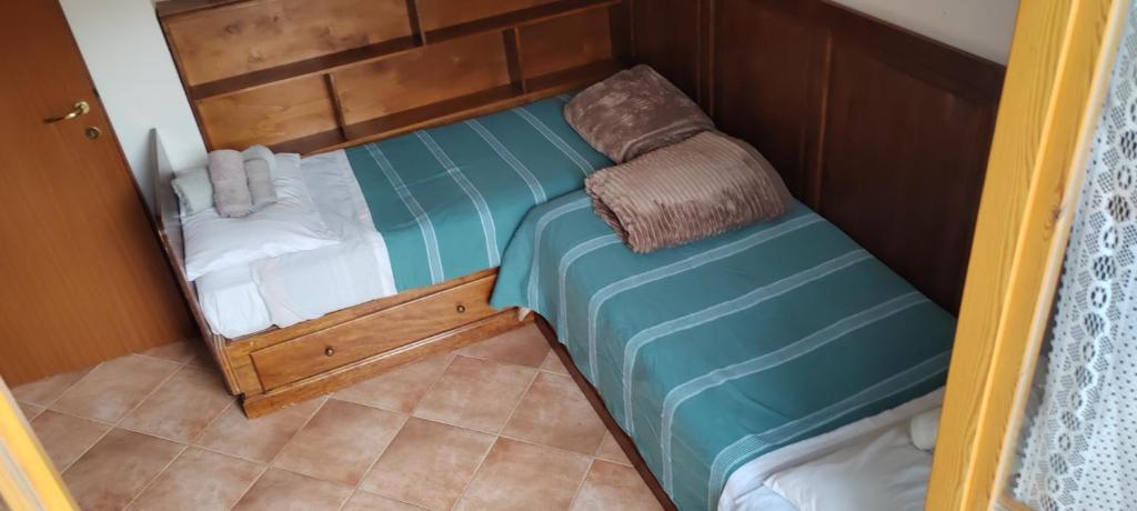 Postel nebo postele na pokoji v ubytování Casa Corone