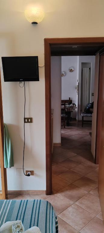 TV a/nebo společenská místnost v ubytování Casa Corone