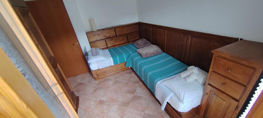 Postel nebo postele na pokoji v ubytování Casa Corone