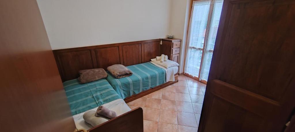 Postel nebo postele na pokoji v ubytování Casa Corone