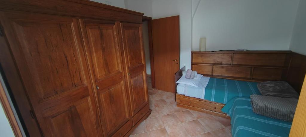 Postel nebo postele na pokoji v ubytování Casa Corone