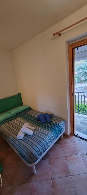 Postel nebo postele na pokoji v ubytování Casa Corone