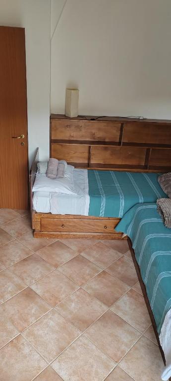 Postel nebo postele na pokoji v ubytování Casa Corone