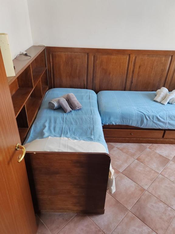 Postel nebo postele na pokoji v ubytování Casa Corone