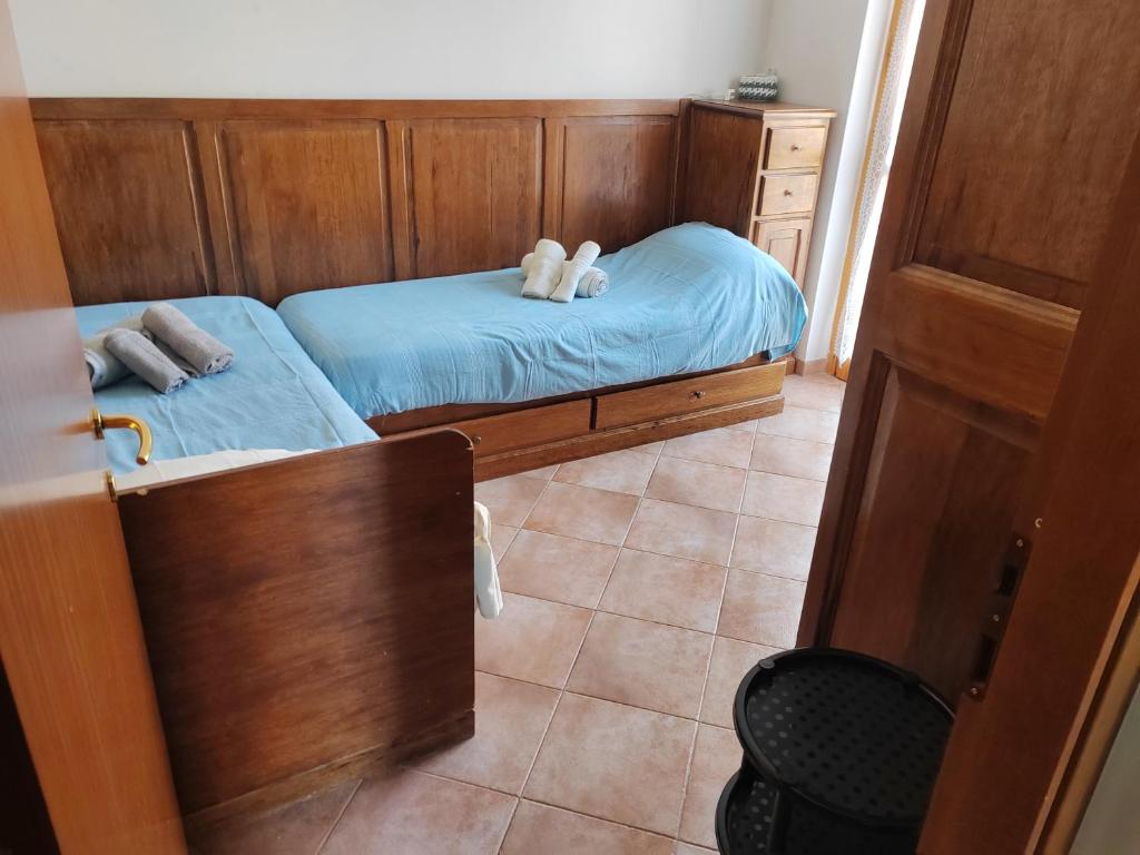 Postel nebo postele na pokoji v ubytování Casa Corone