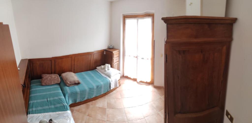 Postel nebo postele na pokoji v ubytování Casa Corone