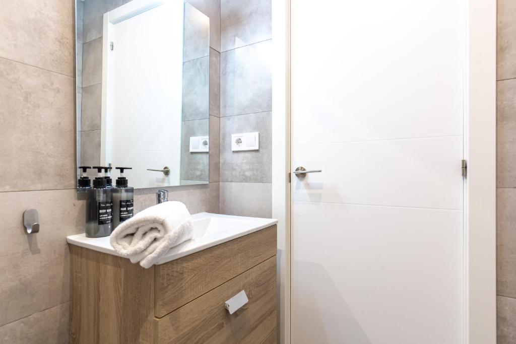 Koupelna v ubytování Picasso Suites Cornellá