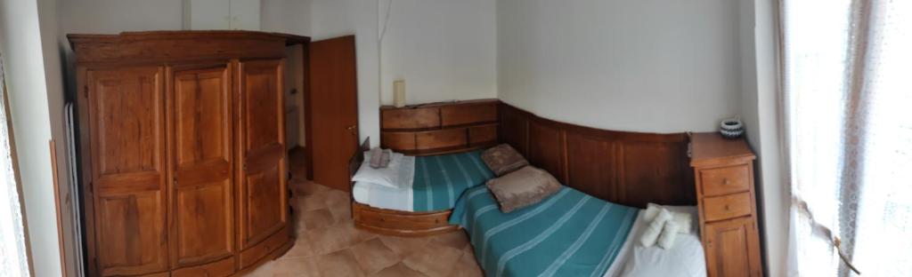 Postel nebo postele na pokoji v ubytování Casa Corone