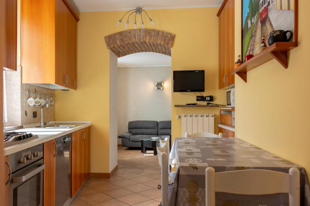 Kuchyň nebo kuchyňský kout v ubytování Casa La Corte in centro, self check in