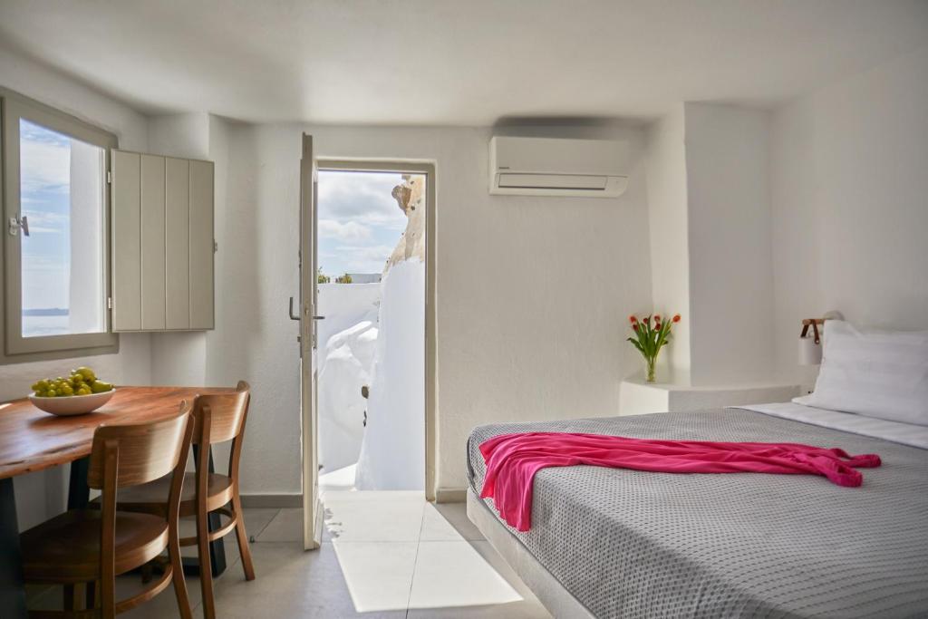Postel nebo postele na pokoji v ubytování Diamond Luxury Suites Collection