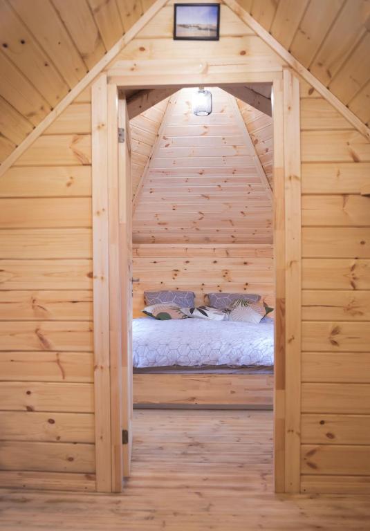 Postel nebo postele na pokoji v ubytování Gîte Le Refuge Nordique