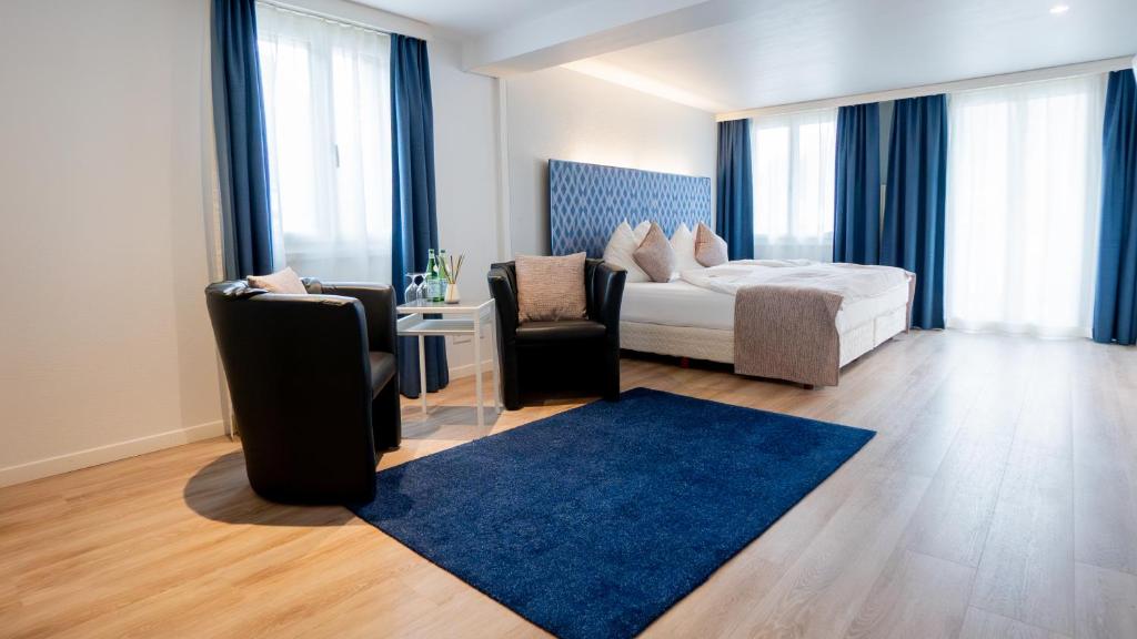 Postel nebo postele na pokoji v ubytování Hotel & Restaurant Rössli