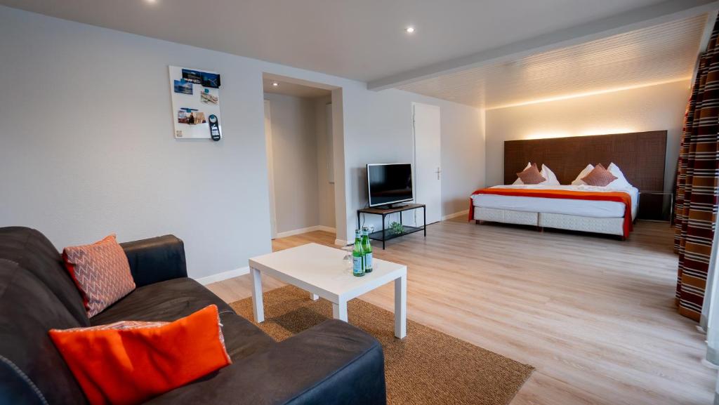Postel nebo postele na pokoji v ubytování Hotel & Restaurant Rössli