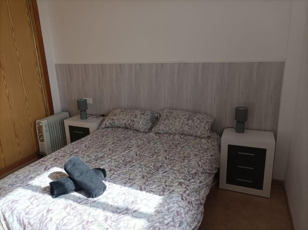 Postel nebo postele na pokoji v ubytování Apartamento con piscina y terraza con vista al mar