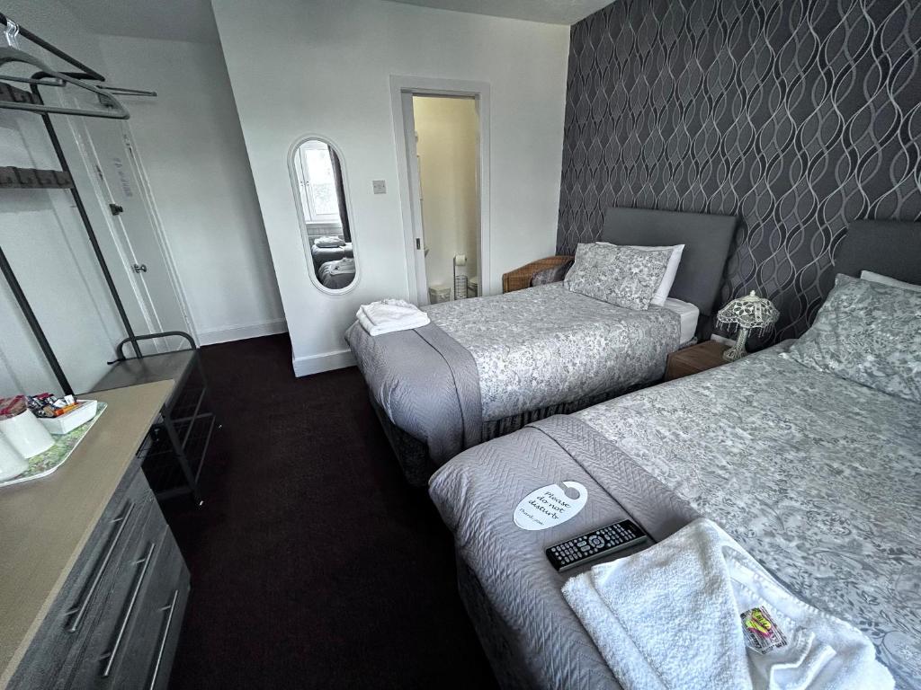 Letto o letti in una camera di DunMoore Guesthouse