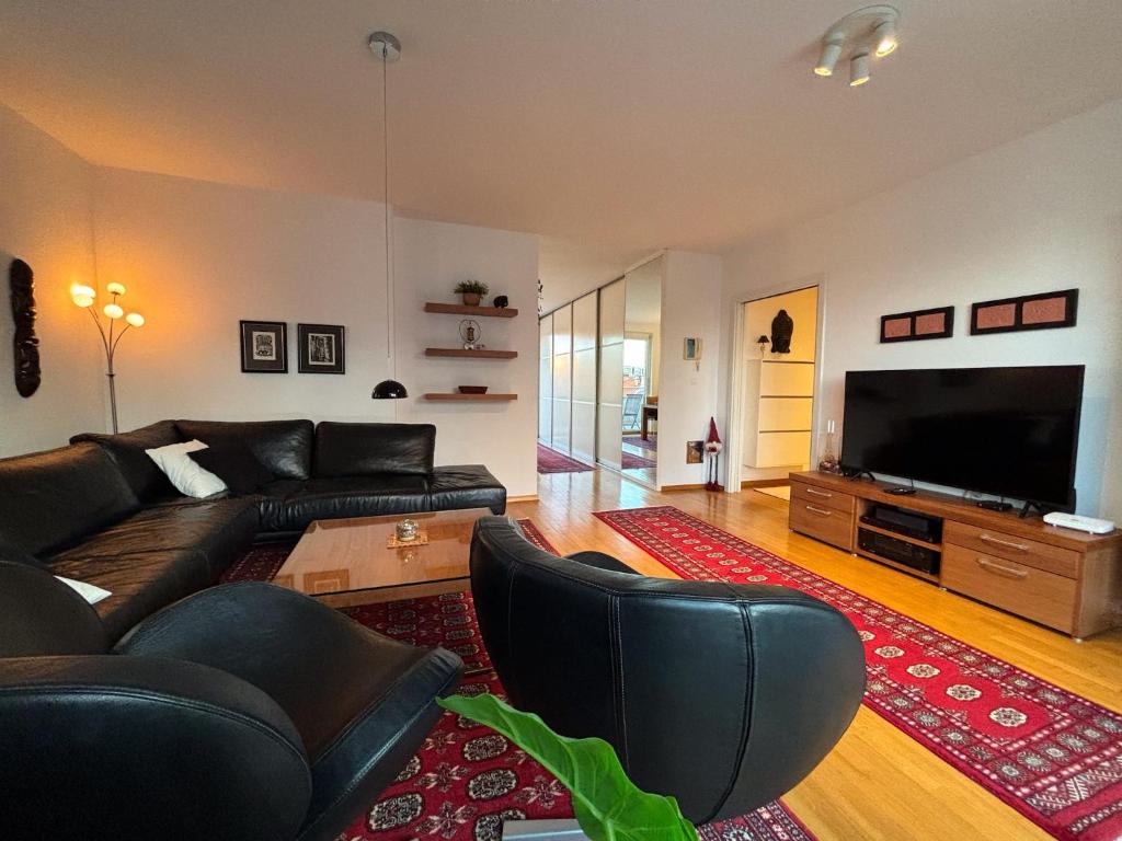 Picture of How to Arrange Three Photo Frames on a Wall - The Spruce