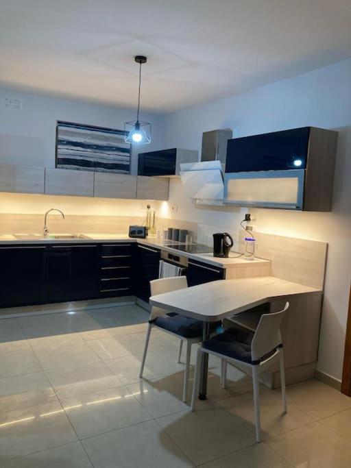 Kuchyň nebo kuchyňský kout v ubytování Happy house