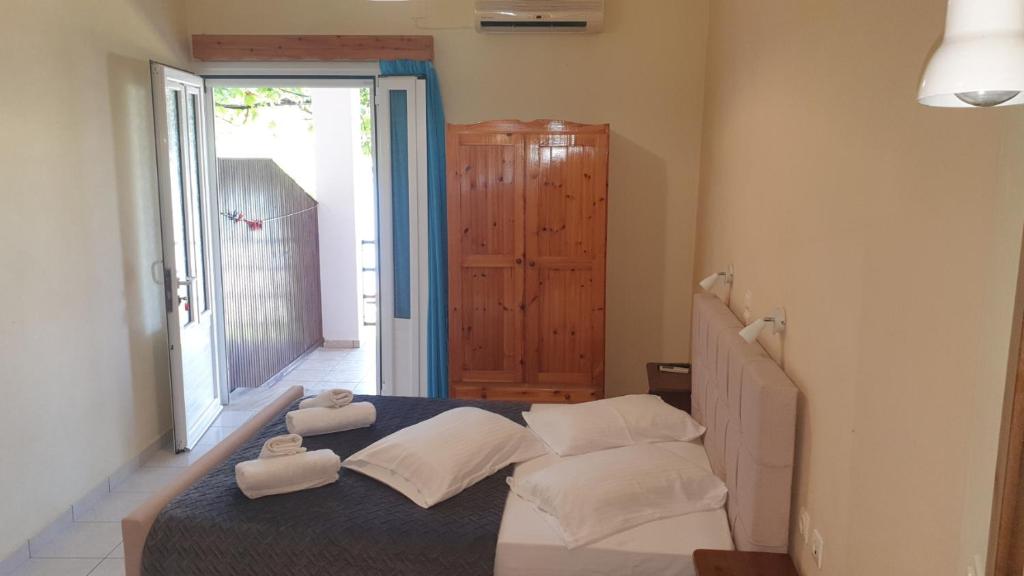 Posteľ alebo postele v izbe v ubytovaní Aggelika Apartments