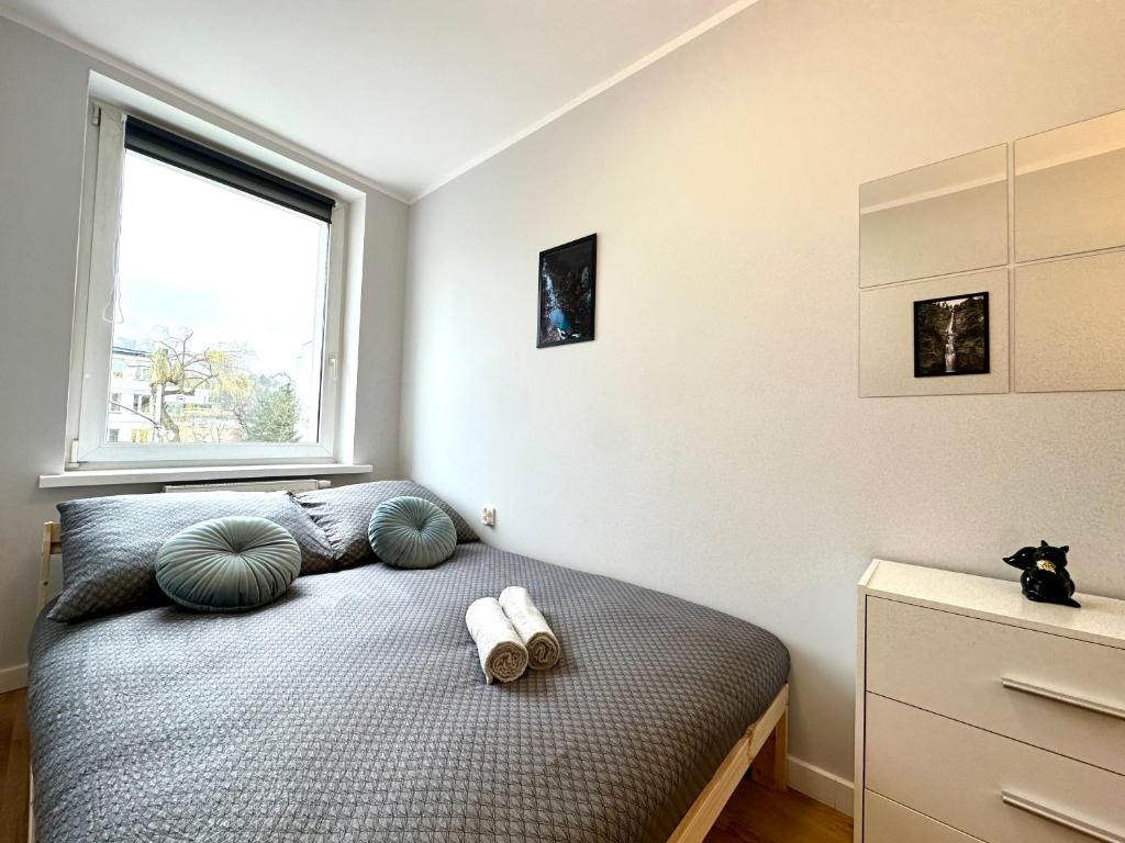 Postel nebo postele na pokoji v ubytování MMRent Waterfall Room