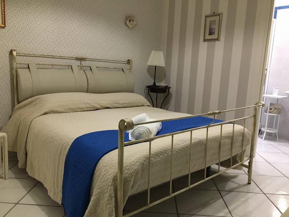 Posteľ alebo postele v izbe v ubytovaní La Tartaruga