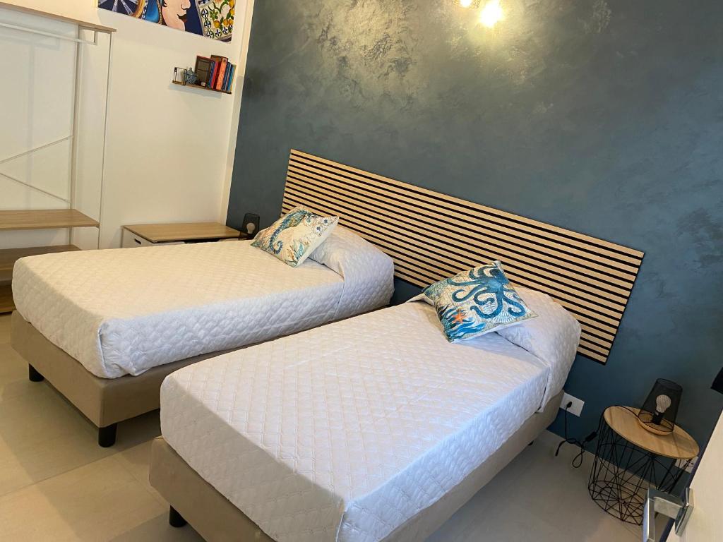 Postel nebo postele na pokoji v ubytování B&B Sicilia in Versi