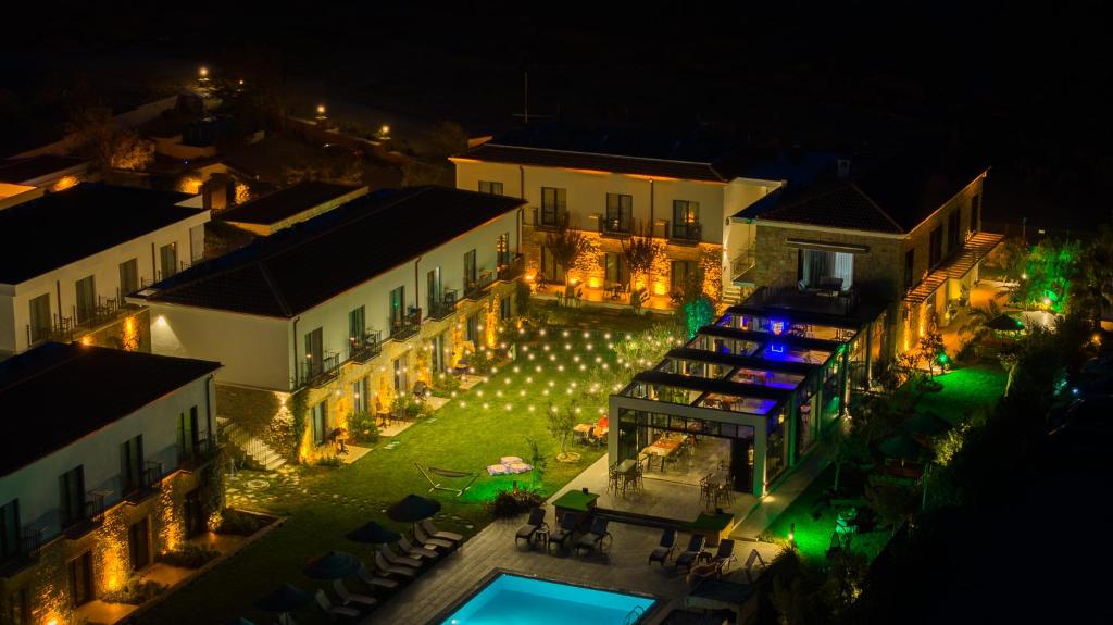 an aerial view of a building at night at Kotinos Beach Hotel in Canakkale