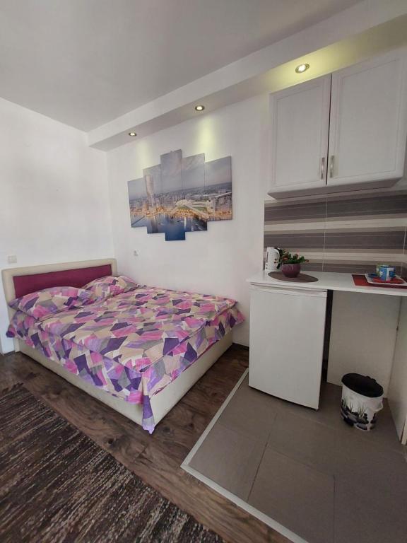 Postel nebo postele na pokoji v ubytování Belgrade Waterfront studio