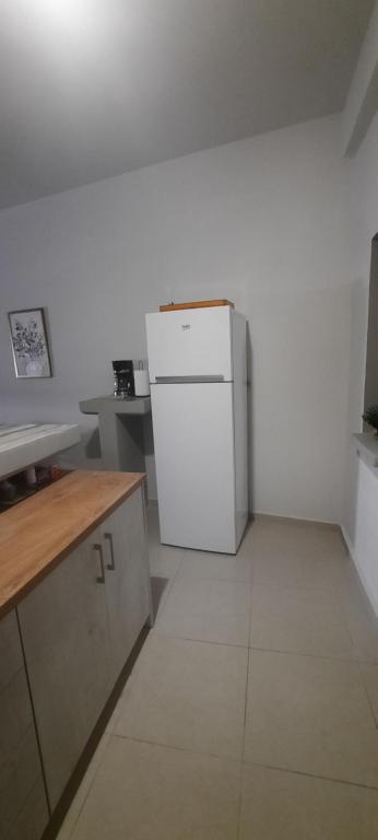 Kuchyň nebo kuchyňský kout v ubytování Studio Areti