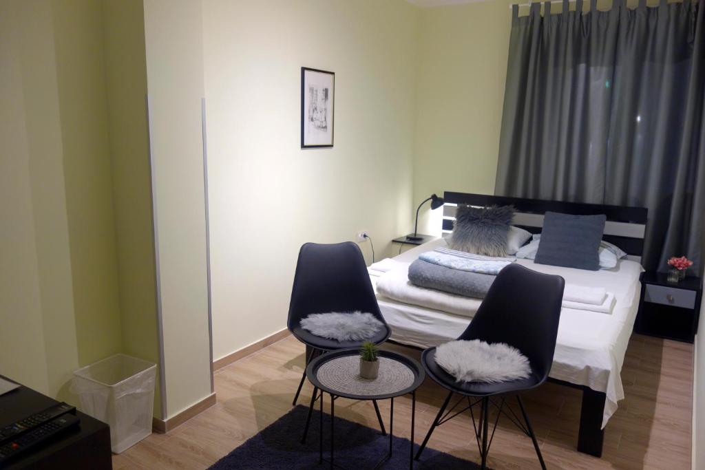 Postel nebo postele na pokoji v ubytování Villa Loop Beograd