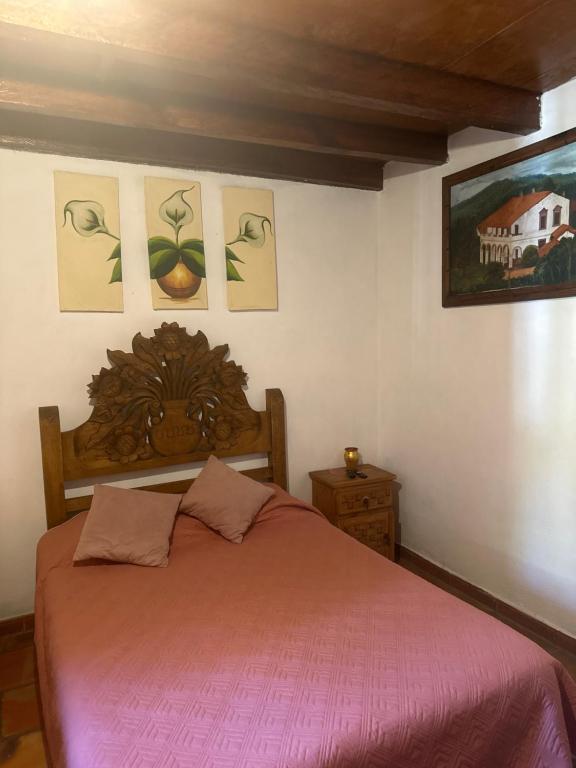Postel nebo postele na pokoji v ubytování Hotel del Pozo