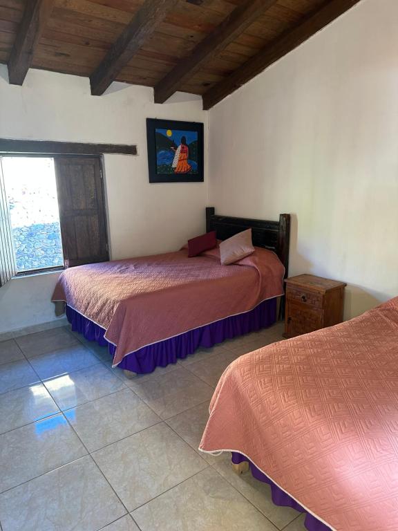 Postel nebo postele na pokoji v ubytování Hotel del Pozo
