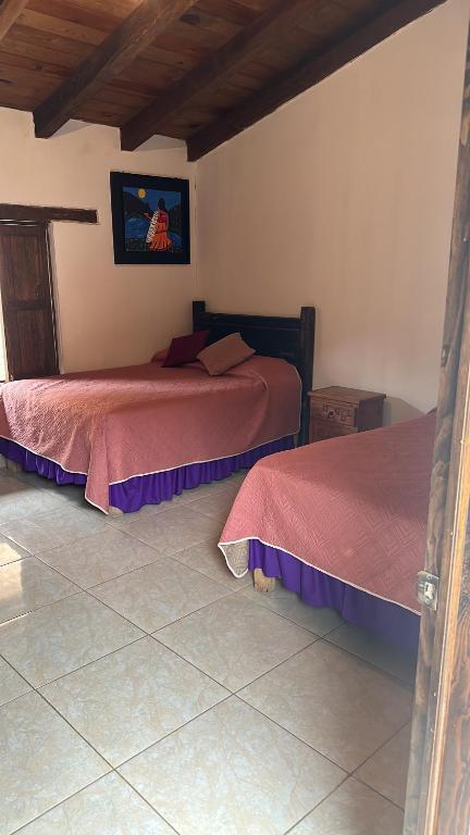 Postel nebo postele na pokoji v ubytování Hotel del Pozo