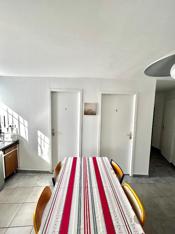 Postel nebo postele na pokoji v ubytování Ô'Berge & Chambres Avignon