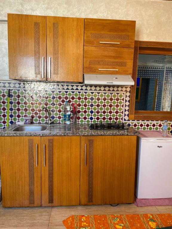Una cocina o zona de cocina en Luxury Studio , heart of Hassan