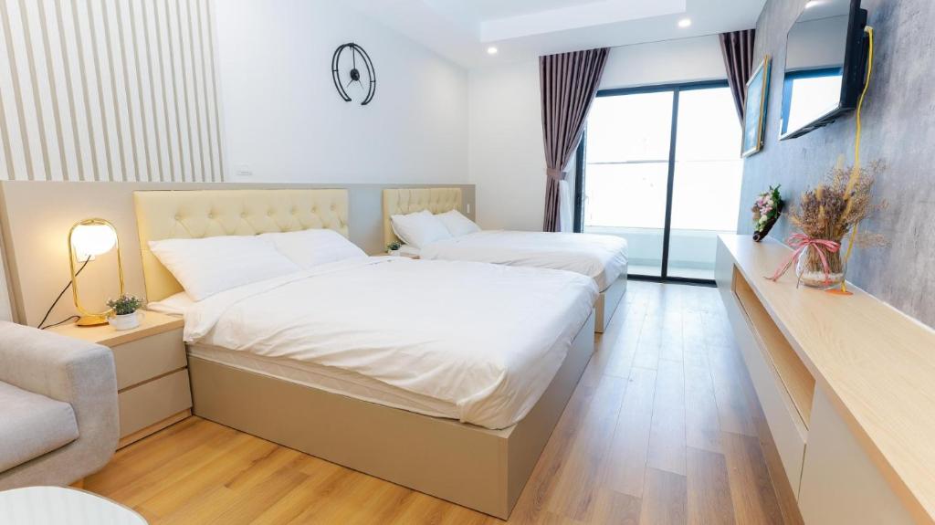 Postel nebo postele na pokoji v ubytování Căn Hộ TMS View Biển Quy Nhơn