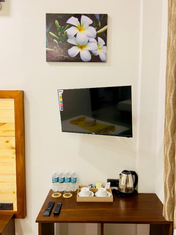 TV a/nebo společenská místnost v ubytování The Golden Park Hotel