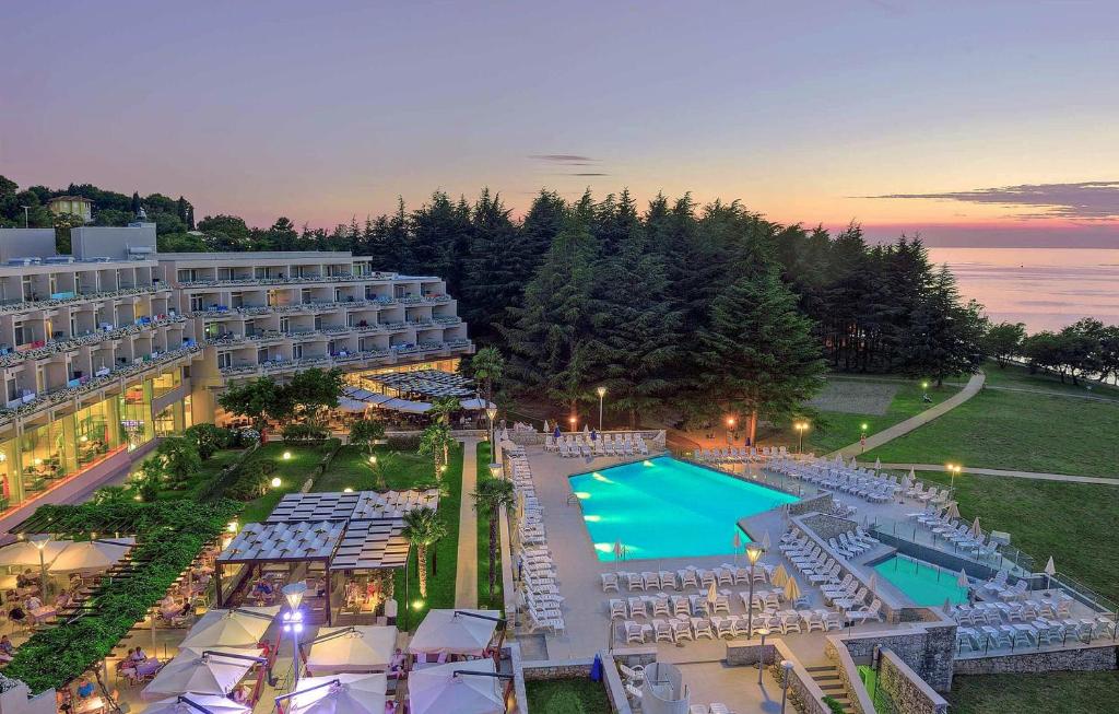 an aerial view of a hotel with a swimming pool at Hotel Mediteran Plava Laguna in Poreč