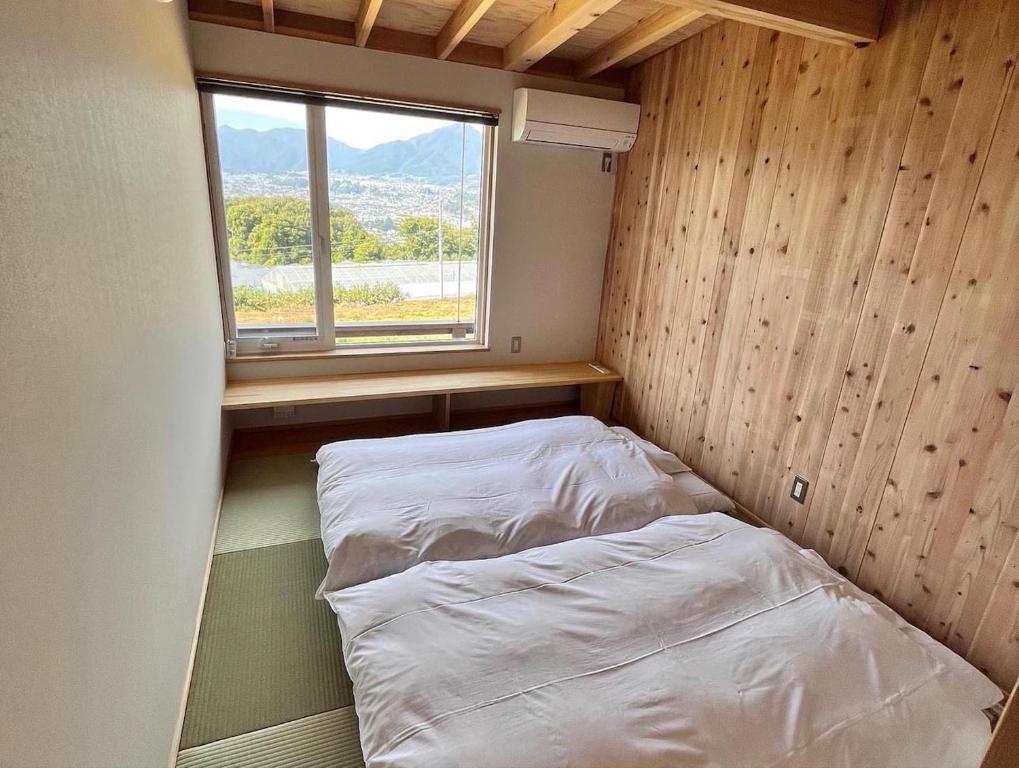 Postel nebo postele na pokoji v ubytování Cider Barn &more